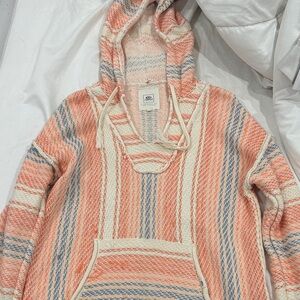 Rip Curl V-Neck Sweater in Coral and Cream